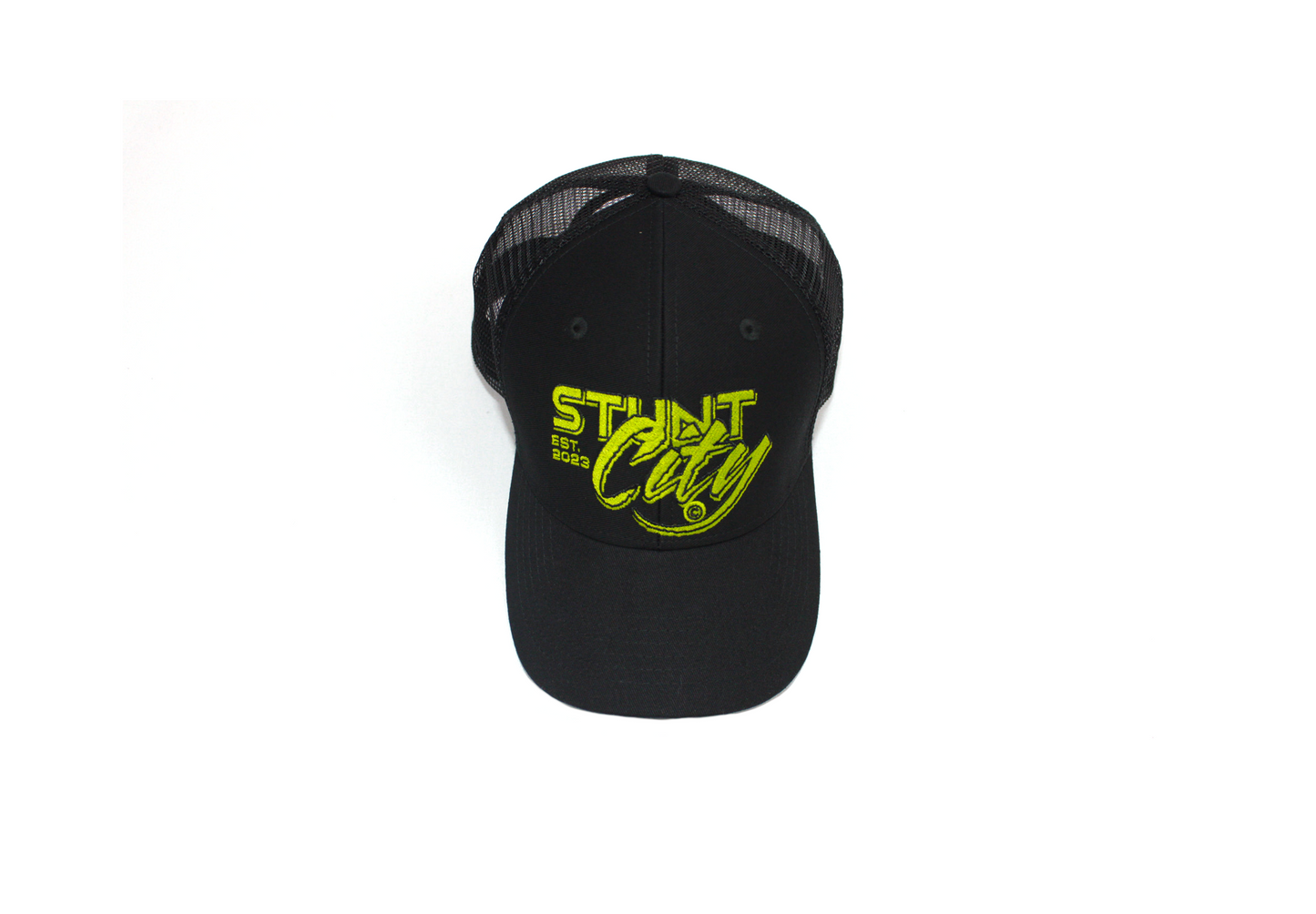 Black trucker hat with green stunt city logo