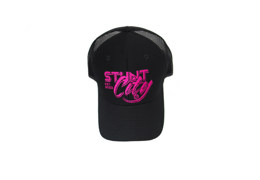 Black trucker hat with pink stuntcity logo